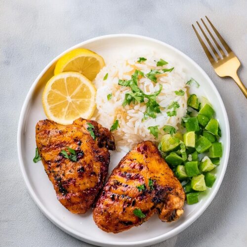 These Sazon Grilled Chicken Thighs are bursting with vibrant flavors that will take your grilling game to the next level! Marinated in a delicious blend of Sazon seasoning, garlic, and lime, these juicy chicken thighs are grilled to perfection, offering a smoky char and tender, flavorful meat. The bright spices create a delightful crust while keeping the chicken incredibly moist. Perfect for summer barbecues or a quick weeknight dinner, these thighs pair wonderfully with rice, beans, or a fresh salad. Ready to spice up your meal? Check out the recipe and enjoy this tasty dish!