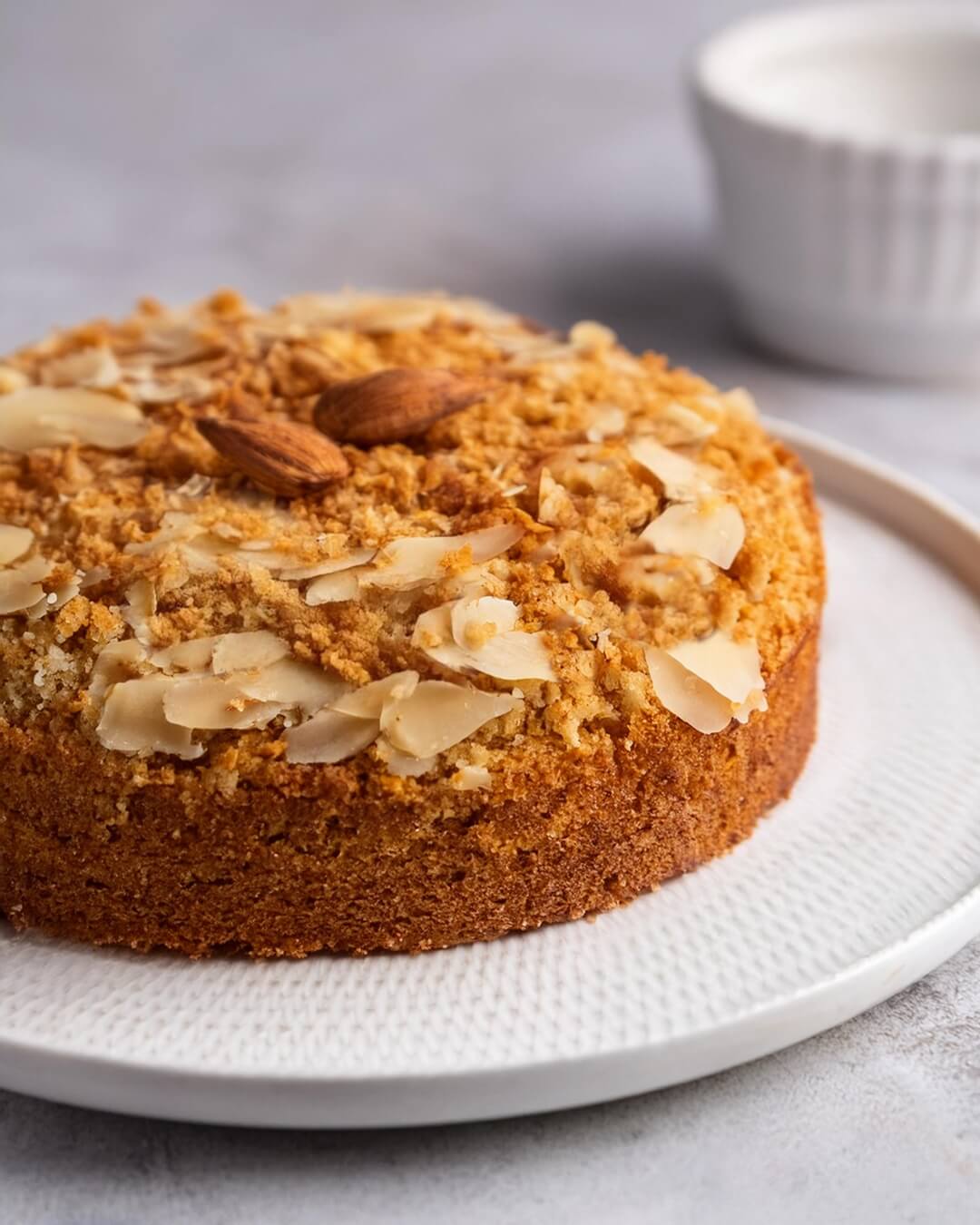 This Almond Coffee Cake combines a tender, almond-infused base with a buttery cinnamon-almond streusel topping. The balance of sweetness, nuttiness, and warmth makes it perfect for pairing with coffee or tea, creating a delightful treat for breakfast or dessert.