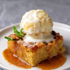 Bread Pudding is a warm, comforting dessert with soft, custard-soaked bread and hints of vanilla, cinnamon, and nutmeg. The slightly caramelized crust and tender interior make it a delightful choice, especially when served with a drizzle of caramel sauce or a scoop of ice cream. Perfect for using up day-old bread in a cozy, satisfying dessert.