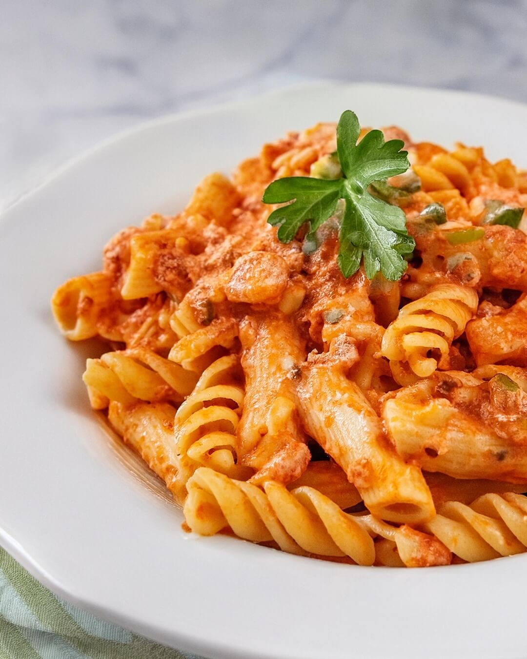 This Buffalo Chicken Pasta combines creamy, spicy, and tangy elements for a comforting dish with a buffalo-inspired twist. It’s great for anyone who loves classic buffalo flavors with a comforting pasta base. Perfect for a cozy dinner or a crowd-pleasing meal option!