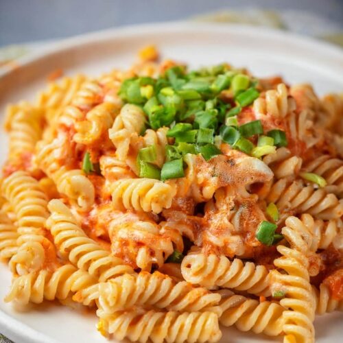This Buffalo Chicken Pasta Salad combines tender pasta, juicy chicken, and crunchy red peppers in a spicy buffalo-ranch dressing. Finished with mozzarella and scallions, it’s a flavorful, creamy dish with just the right amount of heat.