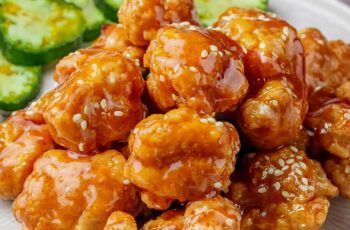 This Chinese Honey Chicken features crispy, golden-battered chicken tossed in a luscious honey sauce with a touch of sweetness from condensed milk. It’s a delicious balance of creamy, sweet, and savory flavors with a delightful crunch.