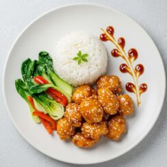 This crispy Chinese honey chicken is coated in a golden batter and sticky-sweet glaze, bursting with bold flavor and ready in just 20 minutes!