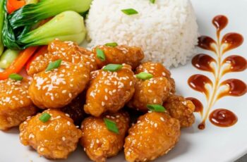 This crispy Chinese honey chicken is coated in a golden batter and sticky-sweet glaze, bursting with bold flavor and ready in just 20 minutes!