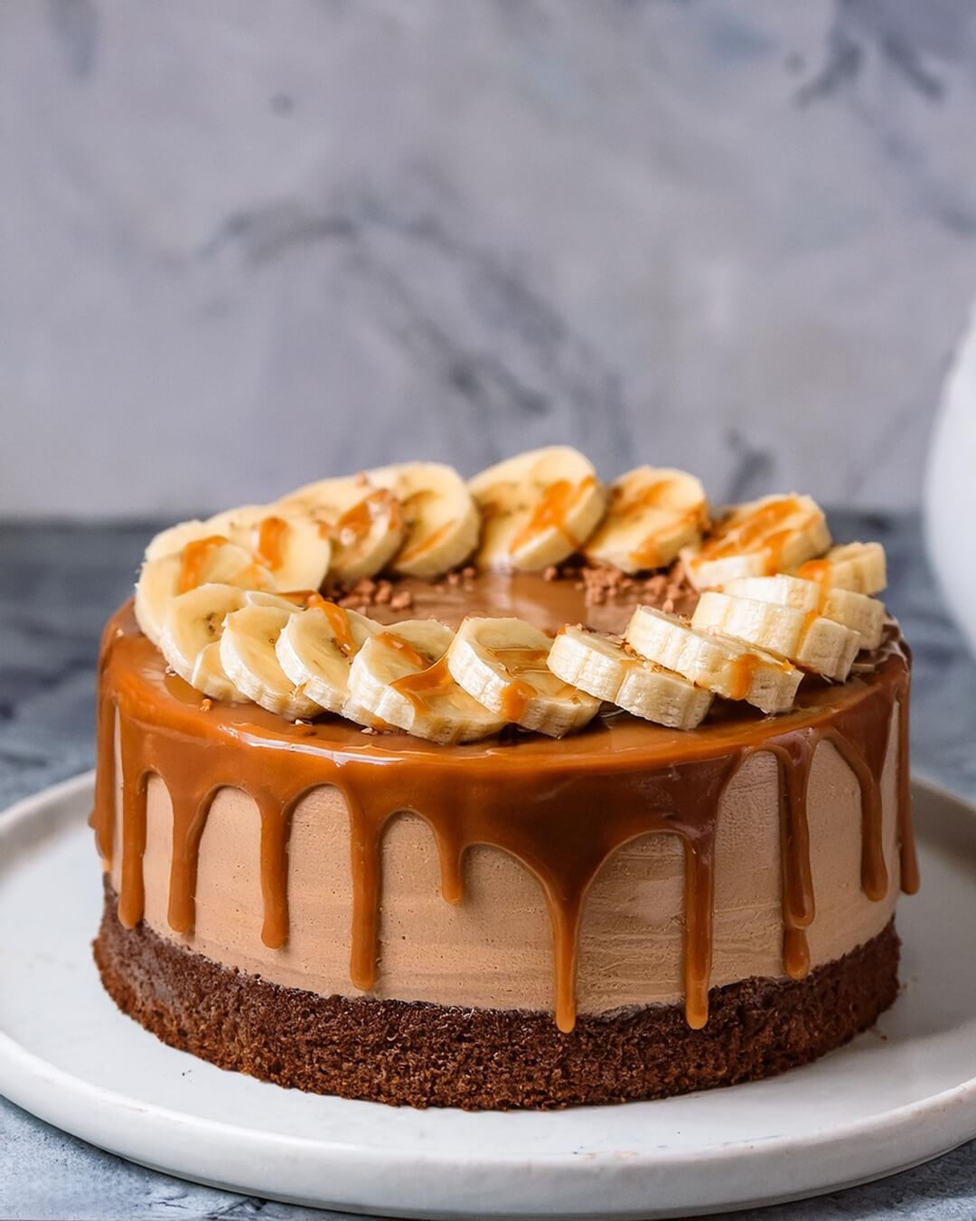 Rich, velvety chocolate cake meets a dreamy caramel frosting in this Chocolate Caramel Cake. Each bite is layered with the deep flavors of cocoa and buttery caramel, creating a dessert that's as indulgent as it is irresistible. Perfect for special occasions or a cozy treat, this cake is sure to bring smiles all around!