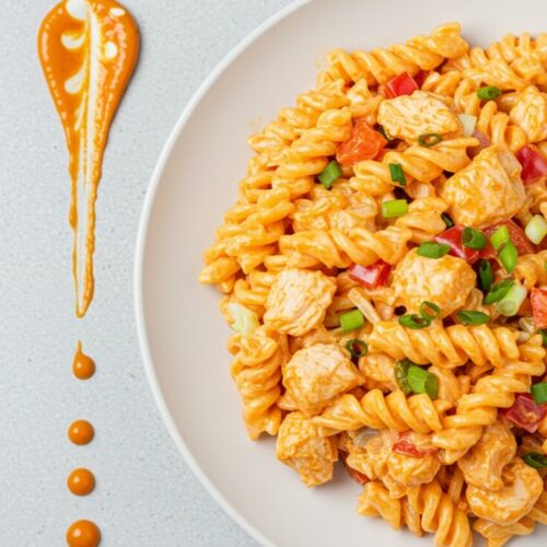 Ready in just 15 minutes, this creamy buffalo chicken pasta salad combines hot sauce, ranch, shredded chicken, and fresh veggies for a quick, flavor-packed dish.