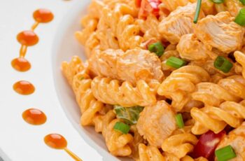 Ready in just 15 minutes, this creamy buffalo chicken pasta salad combines hot sauce, ranch, shredded chicken, and fresh veggies for a quick, flavor-packed dish.