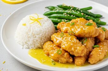 Golden, crispy chicken coated in a zesty lemon glaze—this Chinese lemon chicken is quick, fresh, and better than takeout in just 30 minutes!