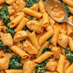 This Tuscan Chicken Pasta is creamy, garlicky, and packed with sun-dried tomatoes and spinach—perfect for cozy weeknights, date-night dinners, or impressing guests without stress.