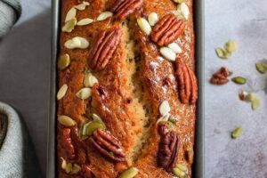 This Pumpkin Greek Yogurt Bread is the ultimate fall treat with its tender crumb and warm, spiced pumpkin flavor. The addition of Greek yogurt makes it extra moist while enhancing the flavor, making each bite a comforting experience. Perfect for breakfast, dessert, or anything in between.