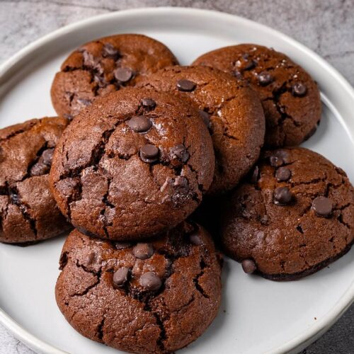 These Salted Brownie Cookies deliver a perfect balance of sweet, salty, and fudgy flavors. The combination of cocoa, dark brown sugar, and sea salt creates a decadent treat that's both indulgent and satisfying.