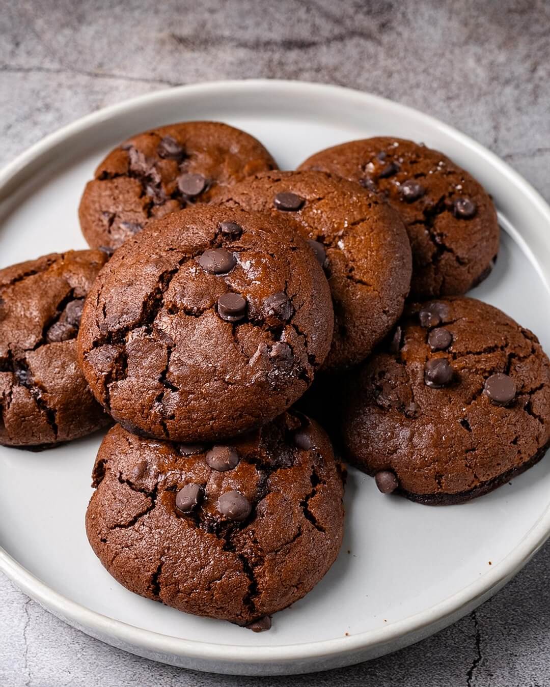 These Salted Brownie Cookies deliver a perfect balance of sweet, salty, and fudgy flavors. The combination of cocoa, dark brown sugar, and sea salt creates a decadent treat that's both indulgent and satisfying.