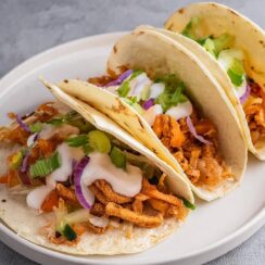 Shredded Chicken Tacos feature juicy, spice-infused chicken that’s simmered with onion, garlic, and salsa, resulting in a filling that’s savory and packed with flavor. Serve in warm tortillas with your favorite toppings like chopped cilantro, diced tomatoes, shredded cheese, or a squeeze of lime for a fresh, satisfying meal that’s easy to customize!