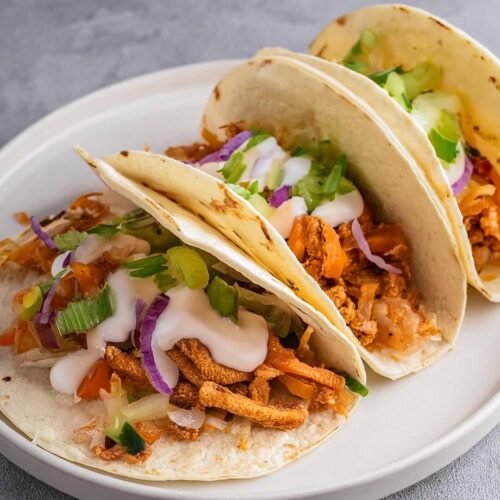 Shredded Chicken Tacos feature juicy, spice-infused chicken that’s simmered with onion, garlic, and salsa, resulting in a filling that’s savory and packed with flavor. Serve in warm tortillas with your favorite toppings like chopped cilantro, diced tomatoes, shredded cheese, or a squeeze of lime for a fresh, satisfying meal that’s easy to customize!