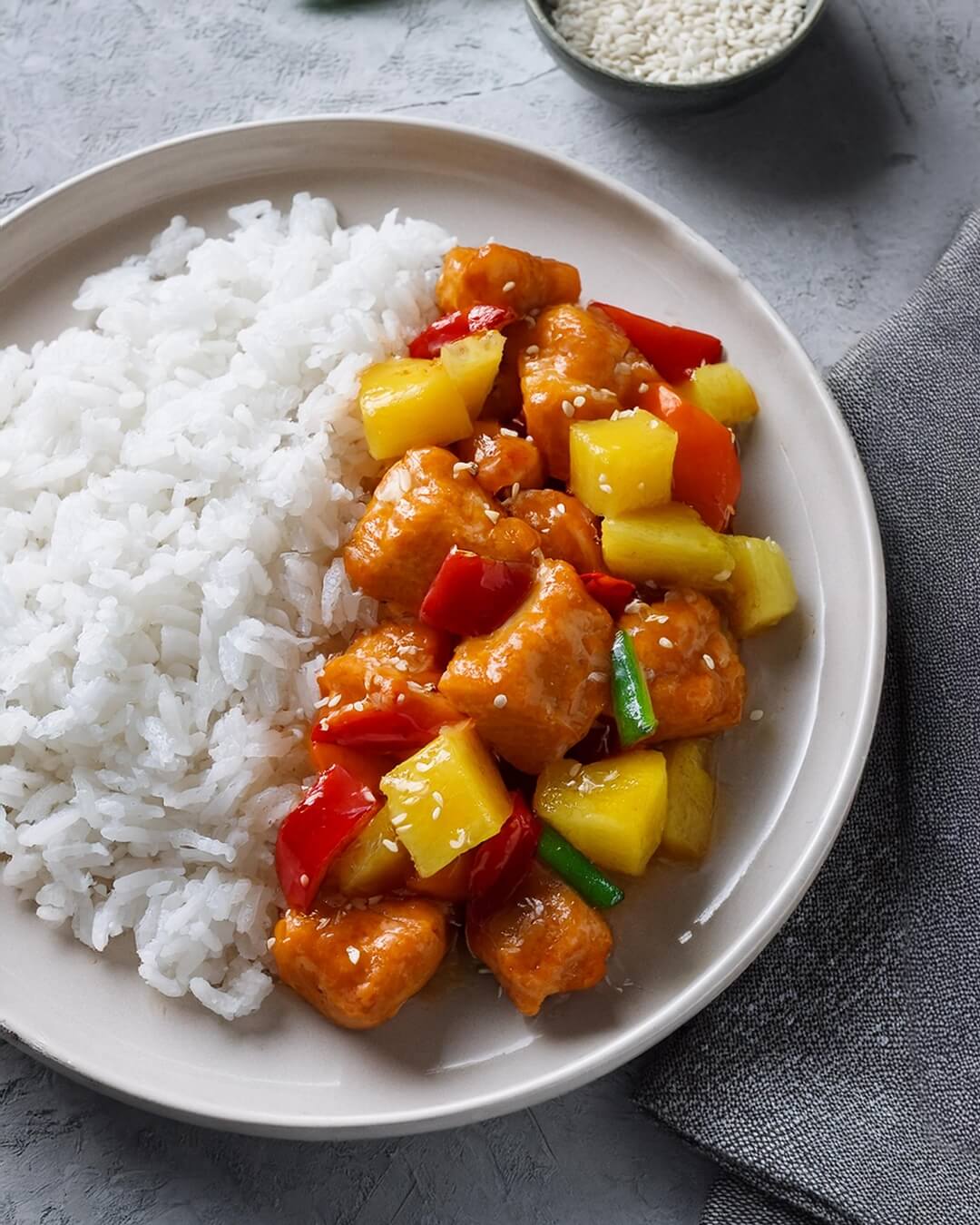 This Sweet and Sour Chicken is a colorful and flavorful dish that pairs crispy chicken with a tangy sauce and vibrant vegetables. The combination of pineapple, red bell peppers, and a zesty sauce makes it a standout, perfect for serving over rice for a satisfying meal.
