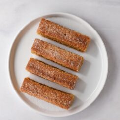 Cinnamon Bars are the perfect blend of soft, buttery sweetness and warm cinnamon spice. Topped with a delightful cinnamon-sugar mixture, these bars are a cozy treat for any time of the year. Ideal for sharing at gatherings or enjoying with a cup of coffee!