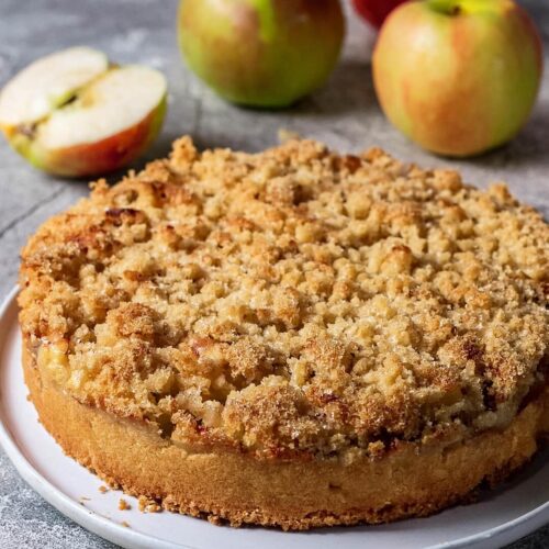 This Apple Crumble Cake recipe is simple, uses basic ingredients that you will have on hand, and makes a perfect dessert or afternoon tea treat.