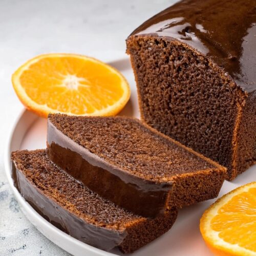This Chocolate Orange Loaf combines the boldness of cocoa with the fresh, zesty flavor of oranges for a perfectly balanced dessert. The moist, dairy-free cake is complemented by a silky chocolate orange frosting that’s rich and vibrant. A delightful treat for any occasion, it's sure to impress with its harmonious blend of flavors!