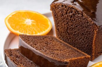 This Chocolate Orange Loaf combines the boldness of cocoa with the fresh, zesty flavor of oranges for a perfectly balanced dessert. The moist, dairy-free cake is complemented by a silky chocolate orange frosting that’s rich and vibrant. A delightful treat for any occasion, it's sure to impress with its harmonious blend of flavors!