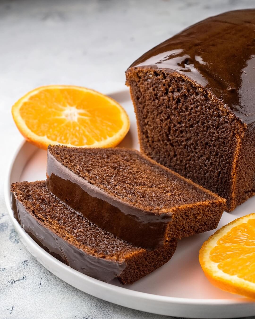 This Chocolate Orange Loaf combines the boldness of cocoa with the fresh, zesty flavor of oranges for a perfectly balanced dessert. The moist, dairy-free cake is complemented by a silky chocolate orange frosting that’s rich and vibrant. A delightful treat for any occasion, it's sure to impress with its harmonious blend of flavors!