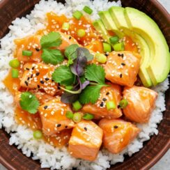 A Salmon Rice Bowl is a nutritious and flavorful dish that combines tender salmon, creamy avocado, and perfectly cooked rice, all garnished with black sesame seeds. This bowl is perfect for a quick lunch or a satisfying dinner, offering a balance of protein, healthy fats, and carbohydrates.