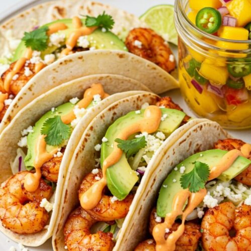Shrimp Tacos with Shrimp Taco Sauce is a delicious and vibrant dish that combines tender shrimp, fresh vegetables, and a creamy sauce, all wrapped in soft tortillas. Perfect for a quick and flavorful meal, these tacos offer a delightful blend of textures and tastes.