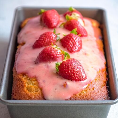 Strawberry Pound Cake features buttery richness with fresh strawberries folded in for a fruity twist. Topped with a sweet, tangy strawberry glaze, this cake is perfect for spring gatherings or as a delightful afternoon treat.