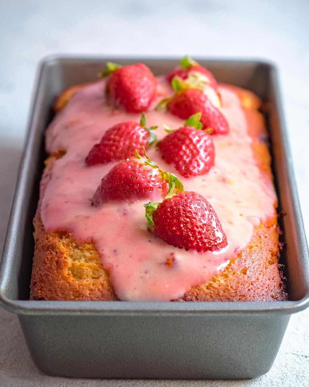 Strawberry Pound Cake features buttery richness with fresh strawberries folded in for a fruity twist. Topped with a sweet, tangy strawberry glaze, this cake is perfect for spring gatherings or as a delightful afternoon treat.