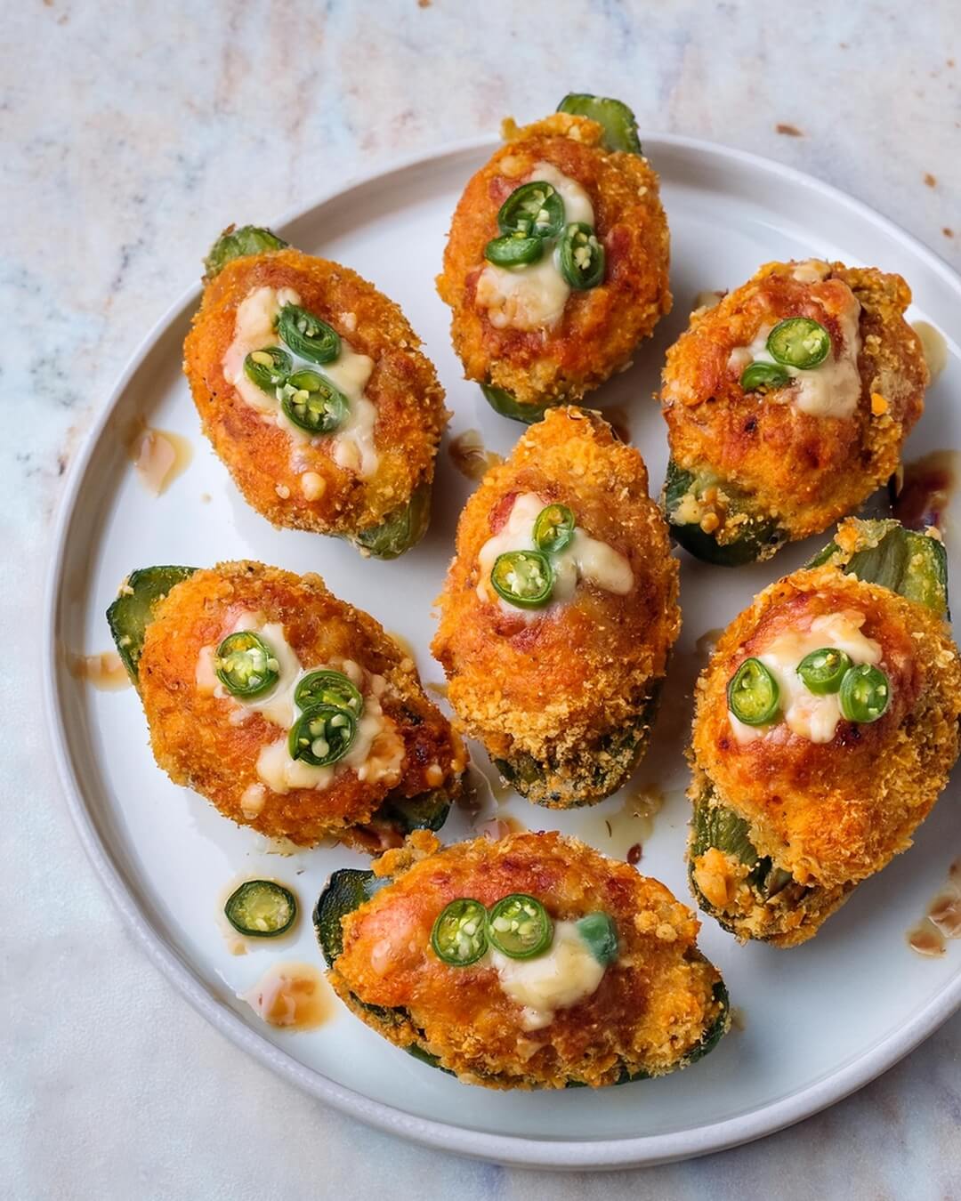 Spicy, cheesy, and packed with bold buffalo flavor, these crispy Buffalo Chicken Jalapeño Poppers are the ultimate game-day snack!