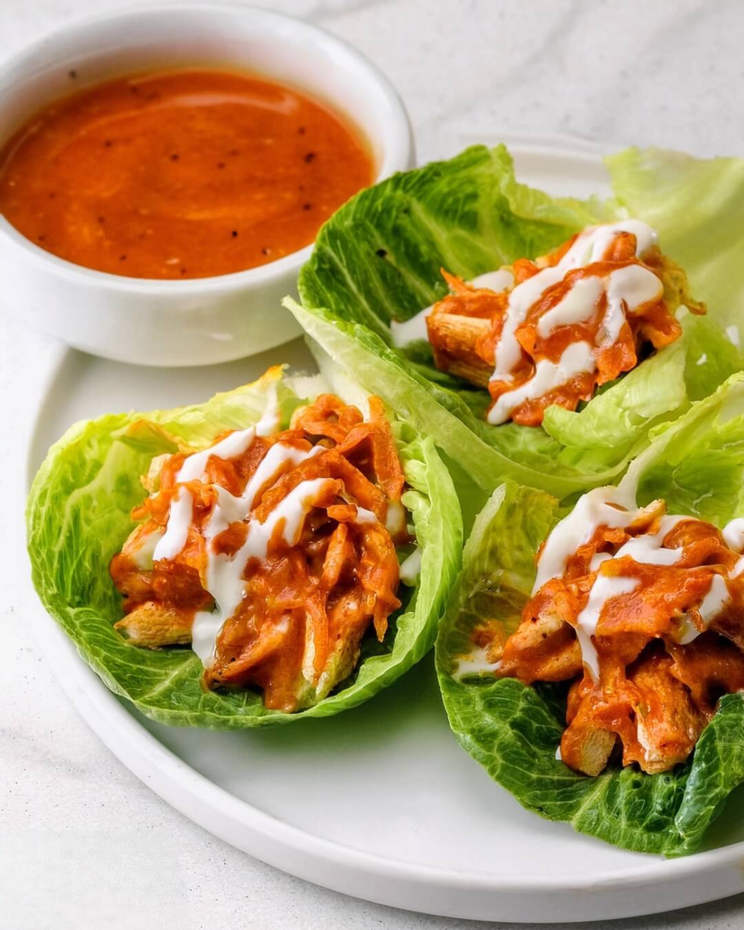 These Buffalo Chicken Lettuce Wraps are spicy, fresh, and loaded with bold flavors! Perfect for a light yet satisfying meal with a delicious crunch!