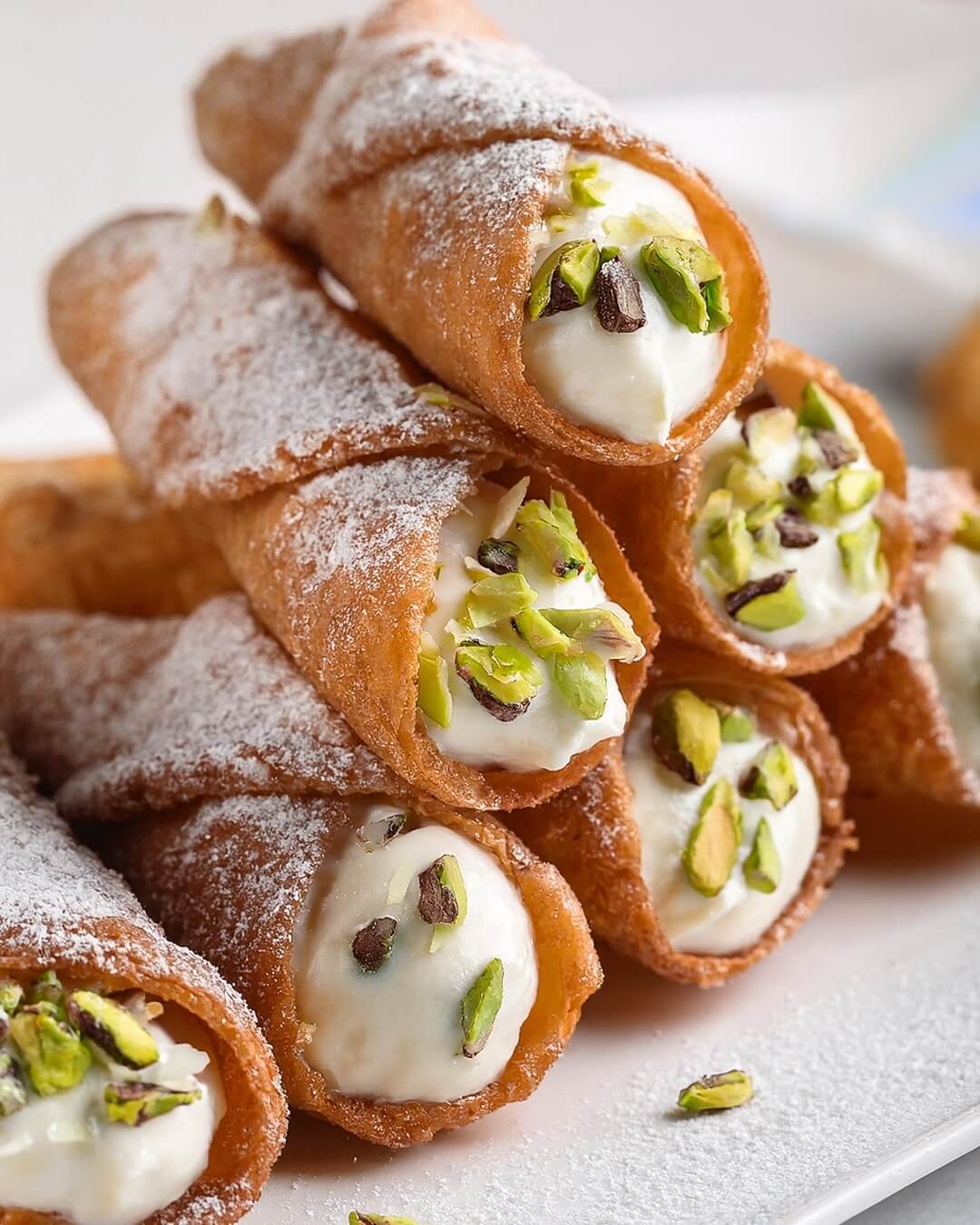 Cannoli are crispy, golden pastry shells filled with a rich ricotta cream, chocolate chips, and a hint of cinnamon—an irresistible Italian classic!
