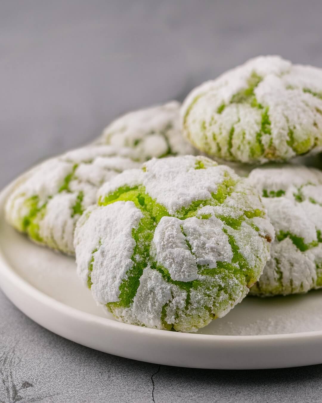 Lime Crinkle Cookies are soft, chewy, and bursting with zesty lime flavor. Coated in powdered sugar, they bake into beautiful crinkles with a bright citrusy taste.