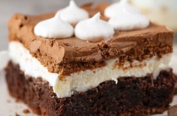 These Coffee and Cream Brownies are rich, fudgy, and topped with a dreamy espresso cream and chocolate ganache—perfect for mocha lovers!