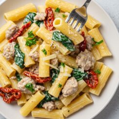 Best Creamy Tuscan Sausage Pasta with Spinach and Tomatoes