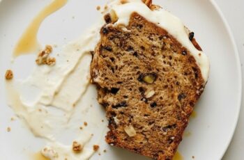 Moist and rich Banana Pecan Bread with a creamy cream cheese layer. Sweet bananas, crunchy pecans, and soft crumb make this loaf irresistible.