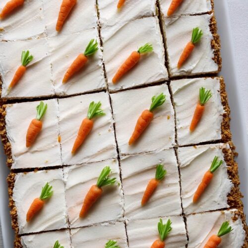 This Carrot Sheet Cake is moist, fluffy, and topped with a dreamy cream cheese frosting—you need this in your life 🥕🍰