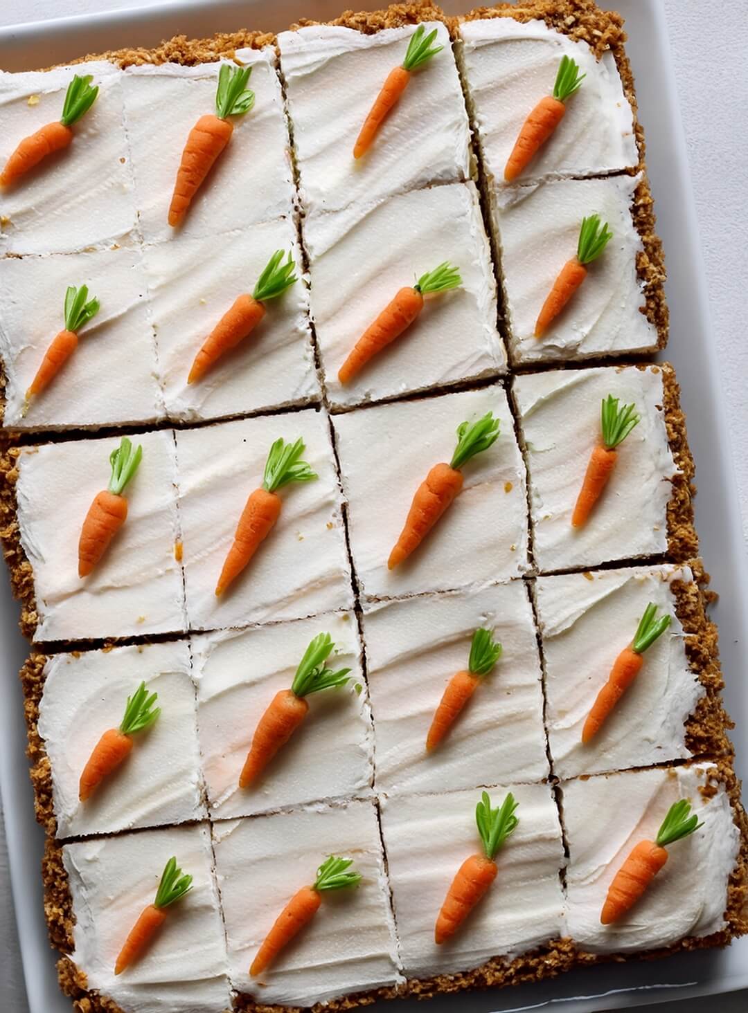 This Carrot Sheet Cake is moist, fluffy, and topped with a dreamy cream cheese frosting—you need this in your life 🥕🍰