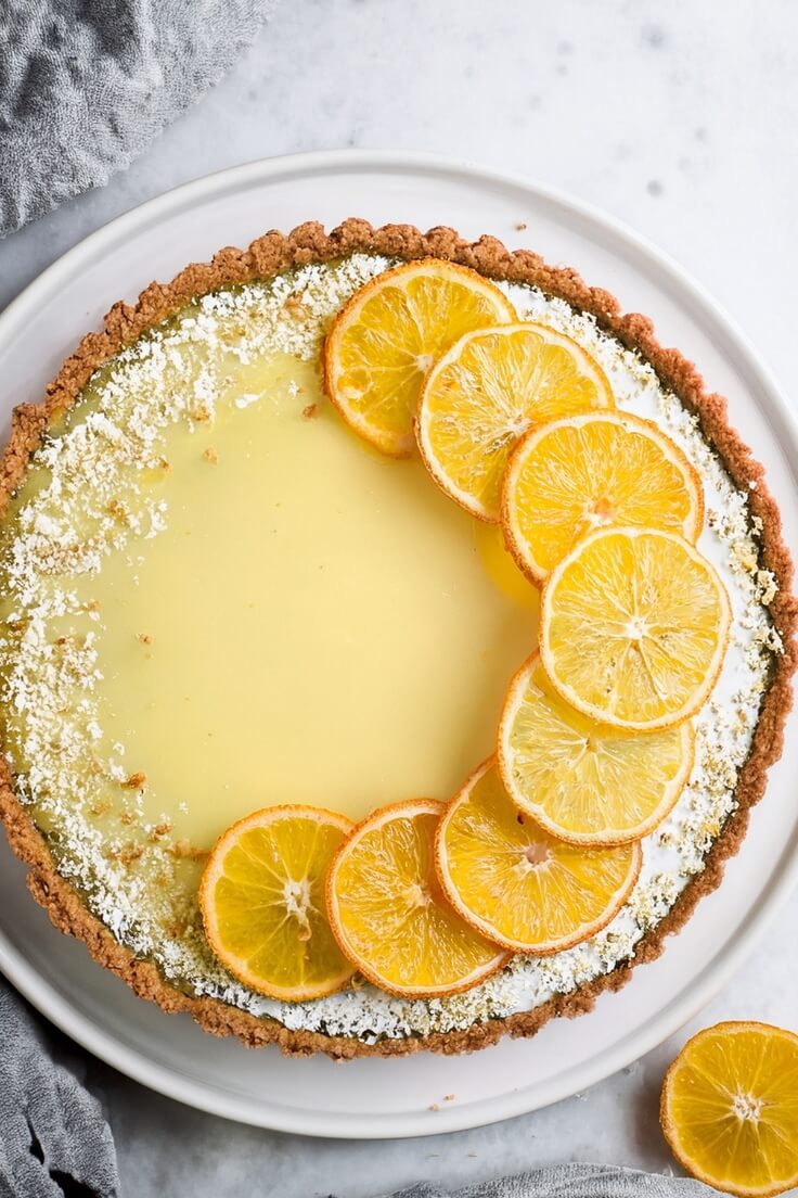 Coconut Lemon Tart is a refreshing, tropical-inspired dessert featuring a crisp coconut crust filled with silky, tangy lemon curd. The combination of bright citrus and sweet coconut creates a light yet satisfying treat that’s as beautiful as it is delicious. Perfect for spring and summer gatherings or anytime you want a dessert that feels like sunshine.