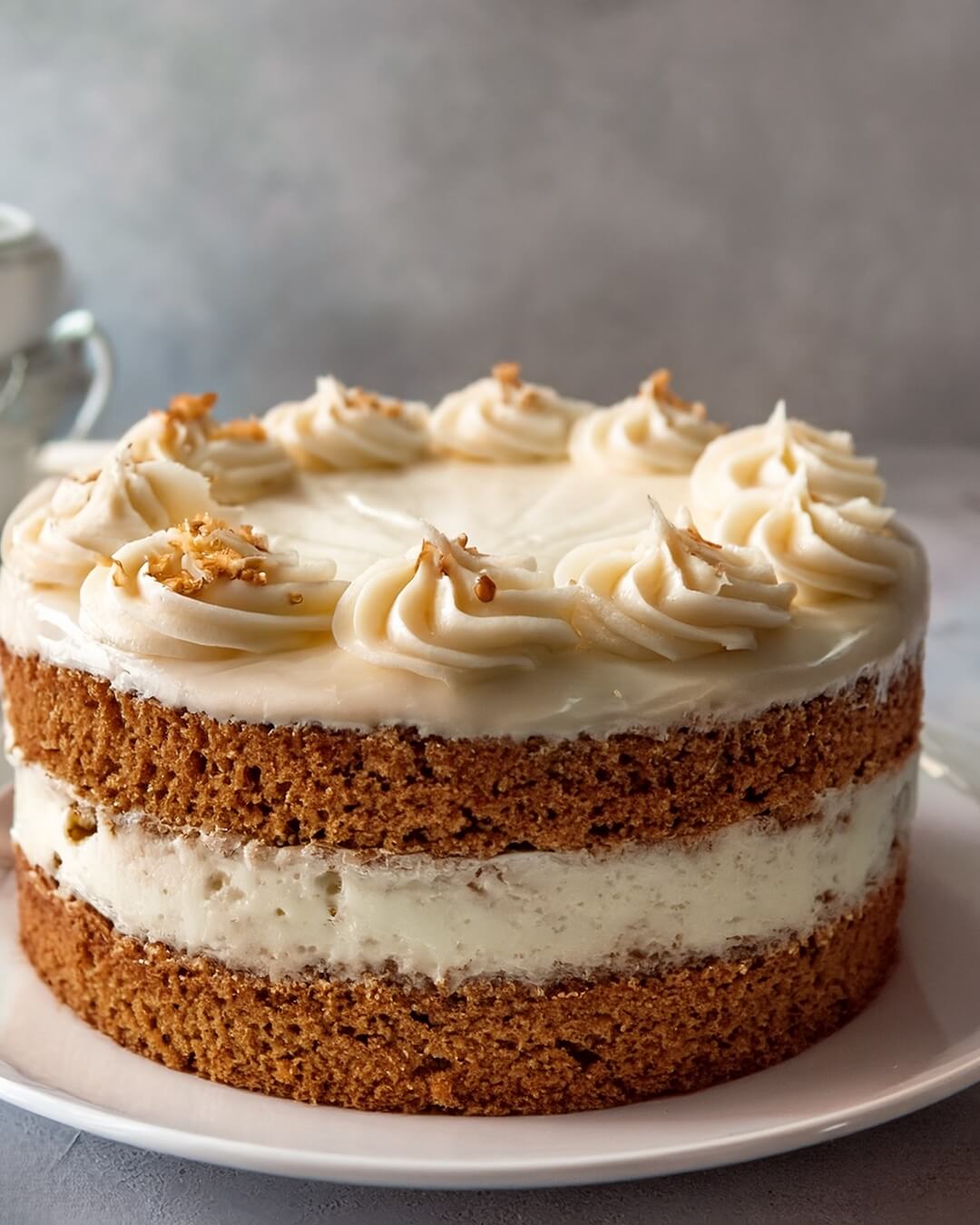 Warm, cozy, and irresistibly spiced! This moist Spice Cake is layered with dreamy cream cheese frosting—perfect for fall or any time of year 🎂🍂