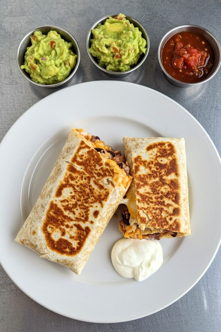 Bean and Cheese Burritos are a quick, comforting classic—loaded with creamy refried beans, melted cheese, and all your favorite toppings for the perfect bite! 🌯🧀🥑