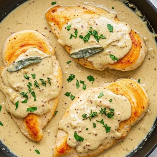 Creamy Dijon Mustard Chicken is a savory and velvety dish with tender chicken breasts, tangy mustard, fragrant herbs, and a touch of honey for perfect balance.