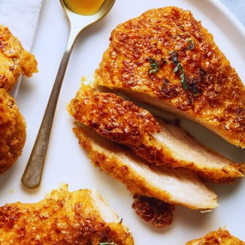 Crunchy Hot Honey Chicken is coated in crispy cornflakes and drizzled with spicy-sweet honey for the ultimate bold, juicy, flavor-packed bite