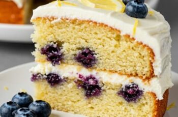 The Lemon Blueberry Cake bursts with citrusy zest, juicy berries, and a rich cream cheese frosting, making it the perfect fruity dessert for any occasion.