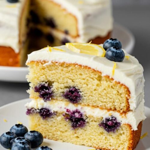 The Lemon Blueberry Cake bursts with citrusy zest, juicy berries, and a rich cream cheese frosting, making it the perfect fruity dessert for any occasion.