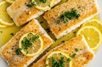 Lemon Butter Cod is flaky, tender, and bathed in a zesty, garlicky butter sauce with fresh herbs and a hint of spice—a quick yet elegant weeknight dinner!
