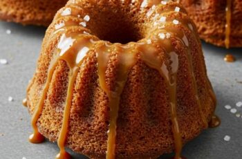 Mini Caramel Cakes are rich, buttery little treats topped with gooey caramel and a touch of flaky sea salt. The perfect balance of sweet and salty in every bite!