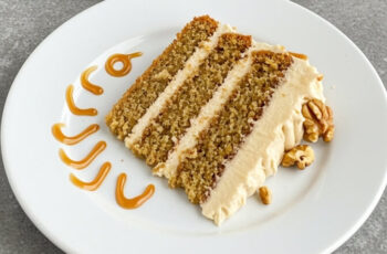 Moist banana cake layered with nutty brown butter frosting and salted caramel drizzle—comfort baking at its finest