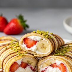 Crepe Rolls with Cream, Strawberries & Chocolate