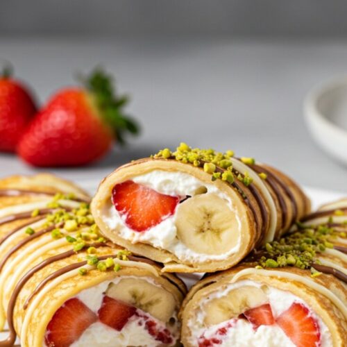 Crepe Rolls with Cream, Strawberries & Chocolate