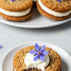 These oatmeal sandwich cookies are chewy, nutty, and filled with a rich brown butter cream cheese frosting—comfort baking at its most indulgent!